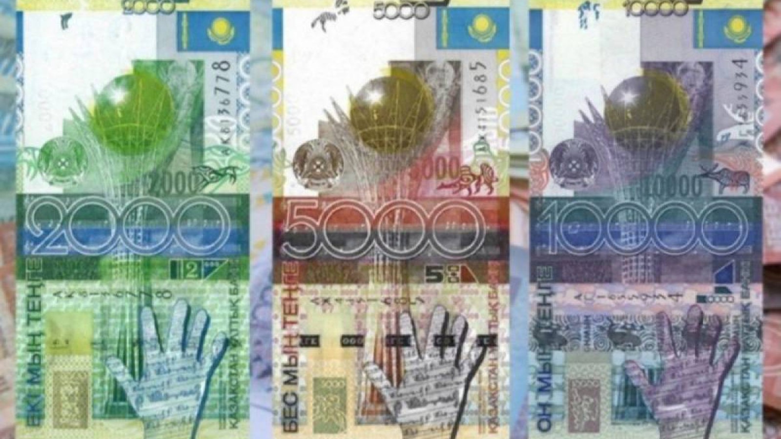 Теңге қолдың суретінен құтылмайтын болды.