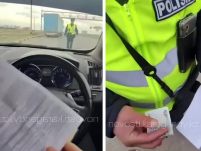 «Барлық жерде ақша талап етеді»: шетелдік Қазақстанда полицейге ақша беріп жатқан сәтін видеоға түсіріп алды
