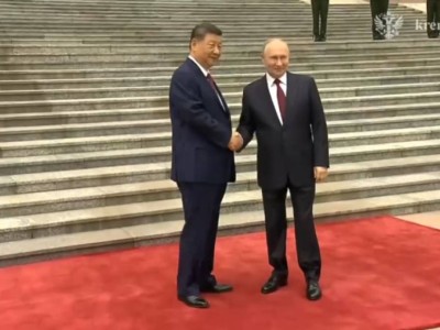 Трамптың сапарынан кейін Си Цзиньпин Путинді қабылдады