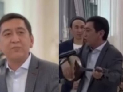 Депутат Ринат Зайытов тойда келіннің бетін ашып жүр (ВИДЕО)